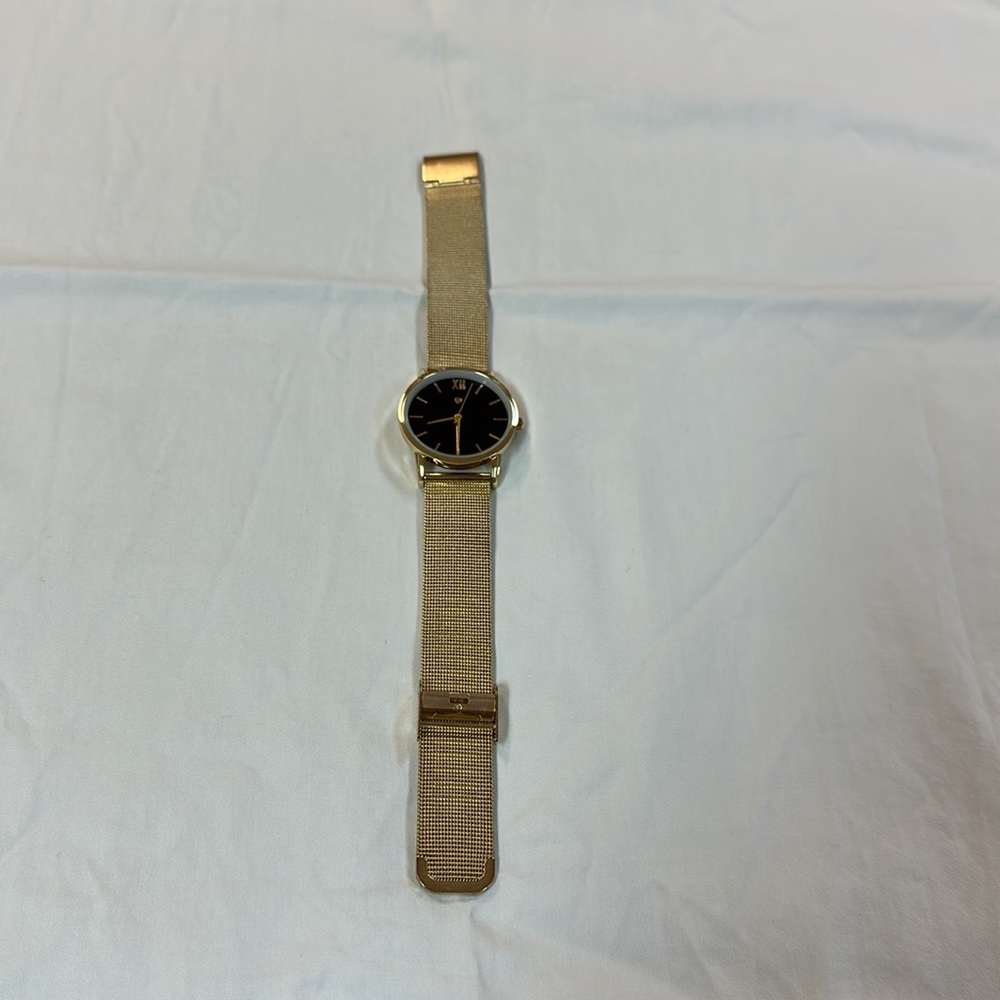 Gold toned watch for women